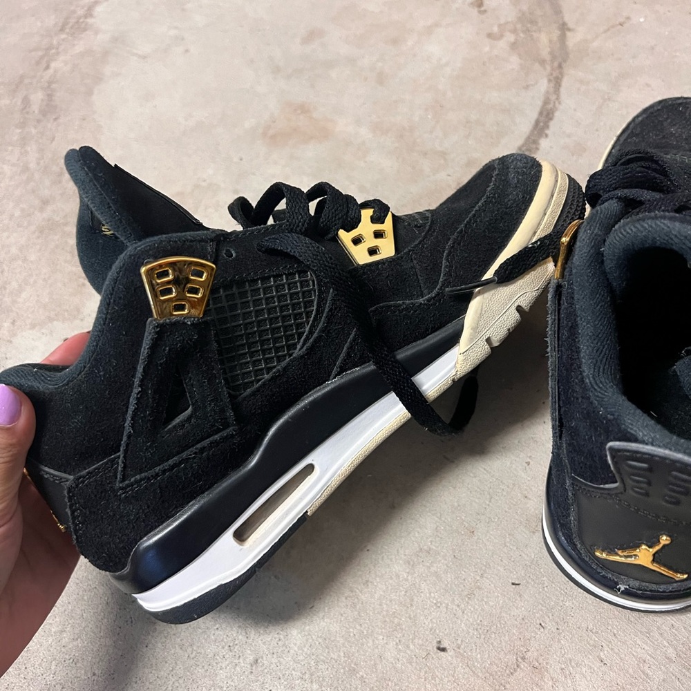 Air Jordan 4 retro royalty in black and gold